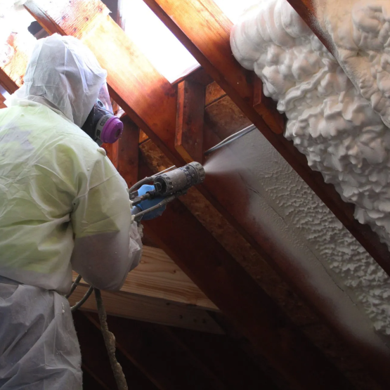 advanced-green-insulation-content-home-05-96d5191d-1920w_result A worker uses a pump to apply spray foam insulation to a roof's inside